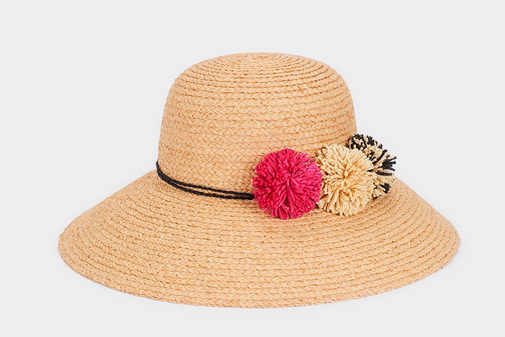 Sombrero de rafia con pompones de colores de Parfois - 22.99€