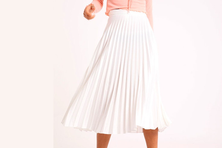 Falda plisada en color blanco de Pimkie faldas midi