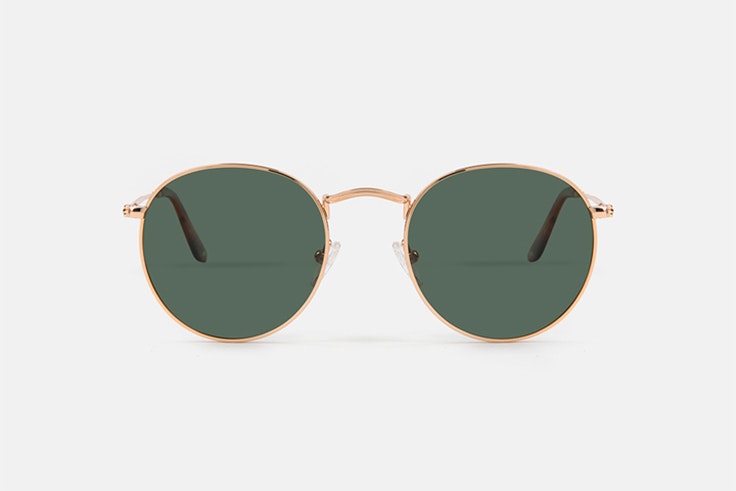 Gafas de sol doradas y redondas de Multiópticas